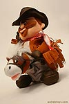 Animatronic cowboy toy that rides a horse and plays music - by Playmotions